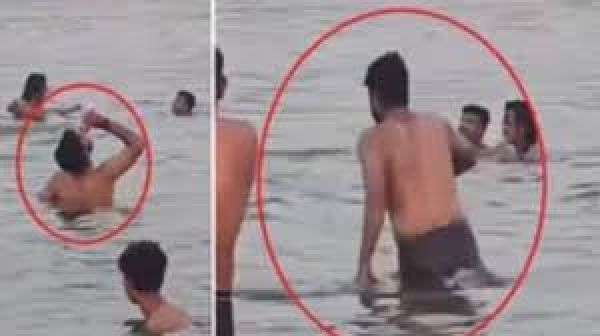 गंगा नदी में बीयर पीते हुए युवक का वीडियो सोशल मीडिया पर हुआ प्रसारित, मुकदमा दर्ज