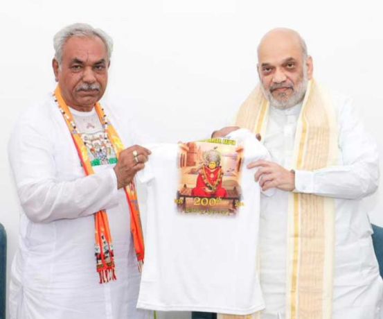 संत युधिष्ठिर लाल ने अमित शाह से की मुलाकात