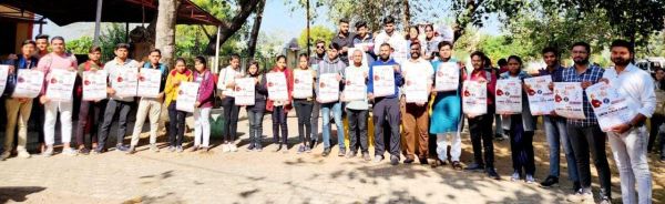 मैराथन दौड़ का भाजयुमो ने किया पोस्टर विमोचन