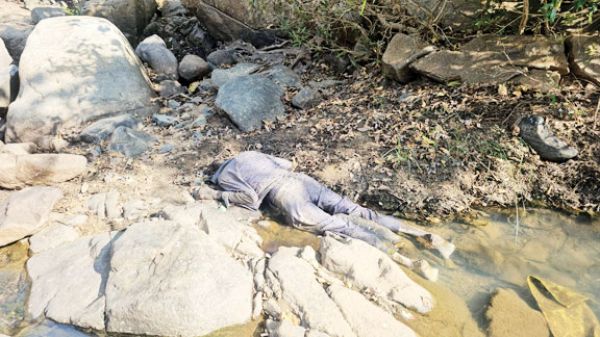एनएच कर्मचारी की लाश पहाडिय़ों के बीच नाले में मिली