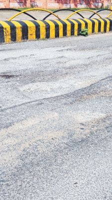 मरम्मत के अभाव में एनएच जर्जर